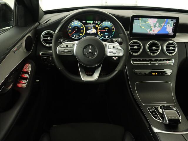 Mercedes-Benz C-KLASSE 300e AMG Limited | Panoramadak | 360 Camera | Stoelverwarming | Carplay | Matrix LED | Leder/Alcantara | Navigatie | Park Assist | Sfeerverlichting | PHEV | Plug In