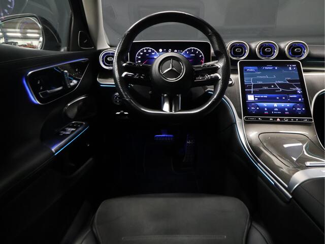 Mercedes-Benz C-KLASSE 200 4MATIC AMG Line [SCHUIFKANTELDAK, ADAPTIVE CRUISE CONTROL, BURMESTER, ELEKTRISCHE STOELEN, 360 CAMERA, SFEERLICHT, CARBON, URBAN GUARD+, NIEUWSTAAT]