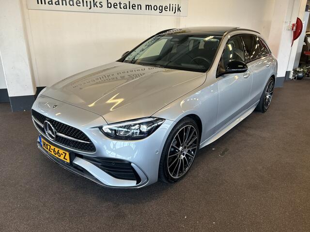 Mercedes-Benz C-KLASSE Estate 180 AMG Line | Panoramadak | Sfeerverlichting | Achteruitrijcamera | Cruise control | Adaptief onderstel | Lane assist | Dodehoeksdetectie | Stoelverwarming | Apple carplay