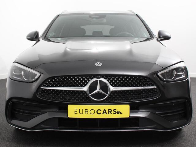 Mercedes-Benz C-KLASSE Estate 200 AMG Line | Climate control | Achteruitrijcamera | Wegklapbare trekhaak | Navigatie | Dodehoek assistent | LED | Sfeerverlichting | Adaptieve cruise control | Verwarmde voorstoelen | Elektrische kofferbak