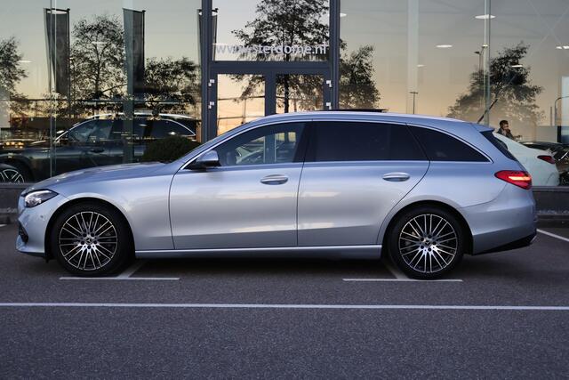 Mercedes-Benz C-KLASSE Estate 200 Avantgarde l Panoramadak l Beige LEDER Interieur l MBUX l LED Adaptief l Camera l Smartphone intergratie l Memory pakket l Winterpakket l Keyless GO l Elektrisch bedienbare achterklep l Draadloos opladen telefoon l Sfeerverlichting l Afneembare