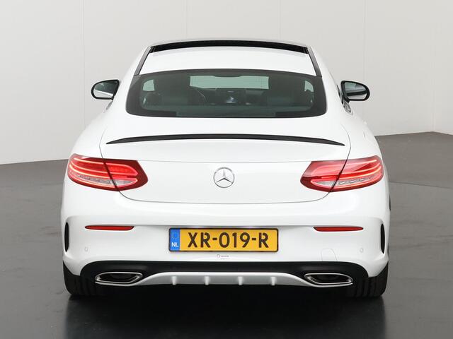 Mercedes-Benz C-KLASSE Coupé 180 Premium Plus | AMG Styling | Panoramadak | Stoelverwarming | LED Koplampen | Sfeerverlichting | Parkeerassistent