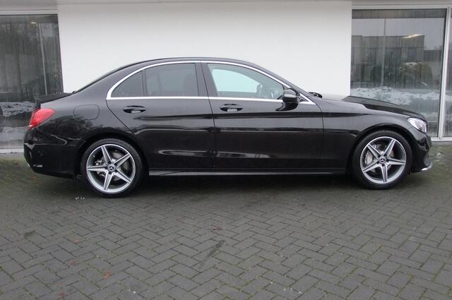 Mercedes-Benz C-KLASSE 180 Business Solution AMG/ 9G/ LED/ All-season/ Stoelverwarming/ Dodehoek assist/ Camera