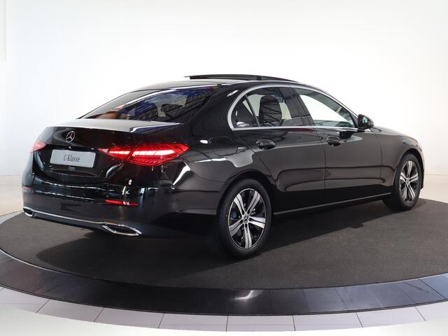 Mercedes-Benz C-KLASSE 180 Business Solution | Panoramaschuifdak | Trekhaak | Achteruitrijcamera | Verwarmde stoelen | Led-koplampen