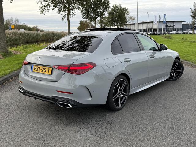 Mercedes-Benz C-KLASSE 180 Business Solution AMG | Panoramadak | Sportstoelen | Digital Light | 360 Camera | DAB | Ele.wegklapbare Trekhaak | Sfeerverlichting | Nightpakket | Spiegelpakket | Apple Carplay/Android Auto |