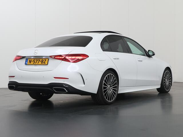 Mercedes-Benz C-KLASSE 180 AMG Line | Night | Panoramadak | Digital Light | Multispaaks AMG velgen | Stoelverwarming | Sfeerverlichting |