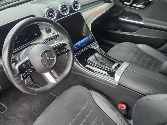Mercedes-Benz C-KLASSE Estate 300 e AMG Line | Wegkl. Trekhaak | Stoelverwarming | PDC Voor+Achter+Camera | Dodehoekdetectie | ECC | Navigatie |