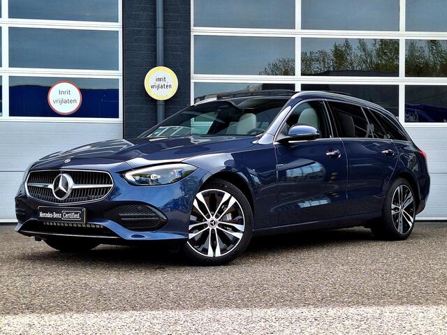 Mercedes-Benz C-KLASSE Estate 300 e Luxury Line | Leder Beige | Panoramadak | Winter Pakket | Trekhaak | DIGITAL LIGHT | DISTRONIC Afstandsassistent | 360° Camera | Stuurverwarming | Apple CarPlay | Android Auto | Elektrisch Verstelbare Stoelen + Memory