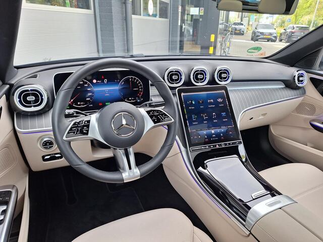 Mercedes-Benz C-KLASSE Estate 300 e Luxury Line | Leder Beige | Panoramadak | Winter Pakket | Trekhaak | DIGITAL LIGHT | DISTRONIC Afstandsassistent | 360° Camera | Stuurverwarming | Apple CarPlay | Android Auto | Elektrisch Verstelbare Stoelen + Memory