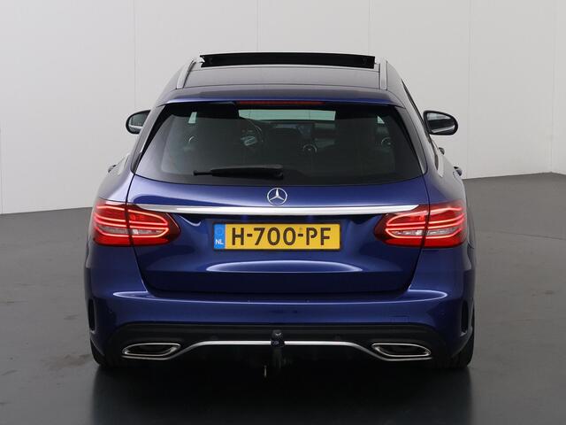 Mercedes-Benz C-KLASSE Estate 200 Business Solution AMG | Panoramadak | Widescreen | Stoelverwarming | Navigatie | High Performance koplampen |