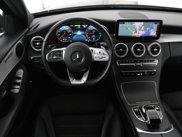 Mercedes-Benz C-KLASSE 300e Business Solution AMG Limited | SOH 82,2% | 360 Camera | Stoelverwarming | Leder/Alcantara | Carplay | Matrix LED | Navigatie | Cruise control | Park Assist | Sfeerverlichting | PHEV | Plug In