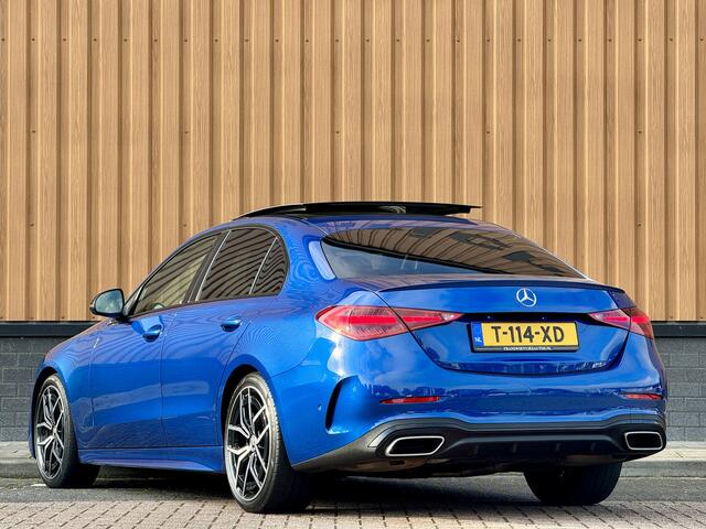 Mercedes-Benz C-KLASSE 300 4MATIC AMG Line | Panoramadak | 360° Camera | 19'' Lichtmetaal | Sfeerverlichting | Digital Light | Elektrische Stoelen + Geheugen | Parkeersensoren