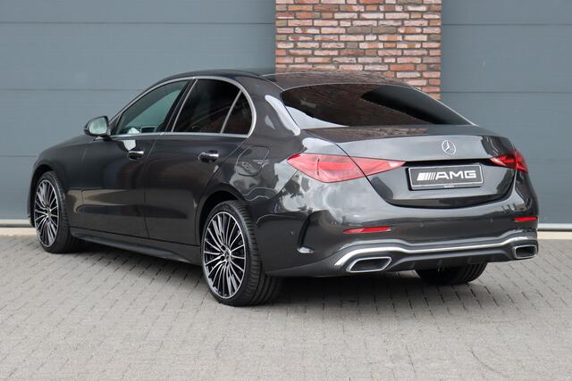 Mercedes-Benz C-KLASSE 300 e 4MATIC AMG Line | Massage | HUD | Memory | Leder | Keyless Go | Dodehoekassistent | Digital Light | Augmented Reality | Surround Camera | Advanced Sound System |