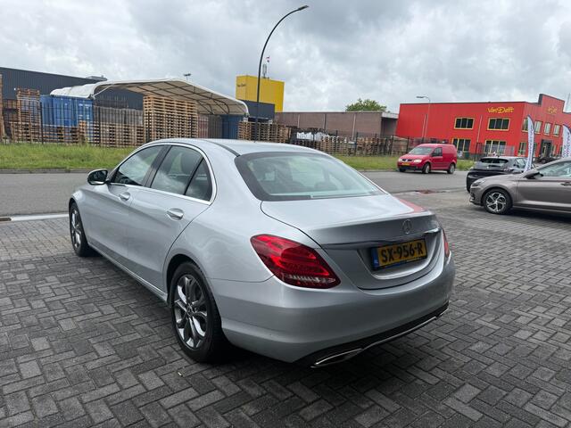 Mercedes-Benz C-KLASSE 180 Business Solution | 2E EIGENAAR | 12MND GARANTIE | AUTOMAAT | CRUISE | LED | CAMERA | STOELVERW. | NAVI |