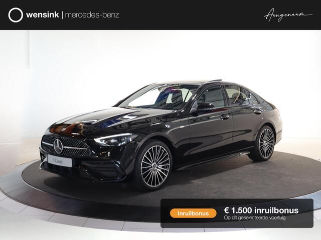 Mercedes-Benz C-KLASSE 300e Business Solution AMG | Panoramaschuifdak | Nightpakket | Digital Light | 19" LM velgen | Dodehoekassistent | 360° camera | Stoelverwarming | Sfeerverlichting |
