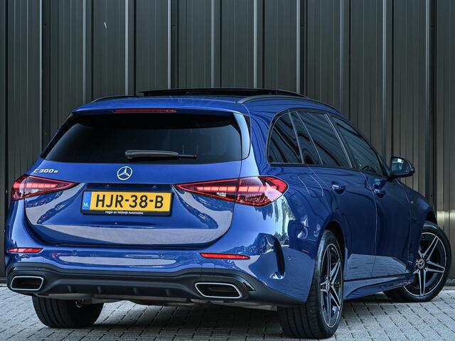 Mercedes-Benz C-KLASSE Estate 300 e Business Solution AMG | NL-Auto | Panoramadak | 360 Camera | Burmester | Night-Pakket | Memory Seats | Head-Up | ACC | Ambiance Interieur | Stuurverwarming |