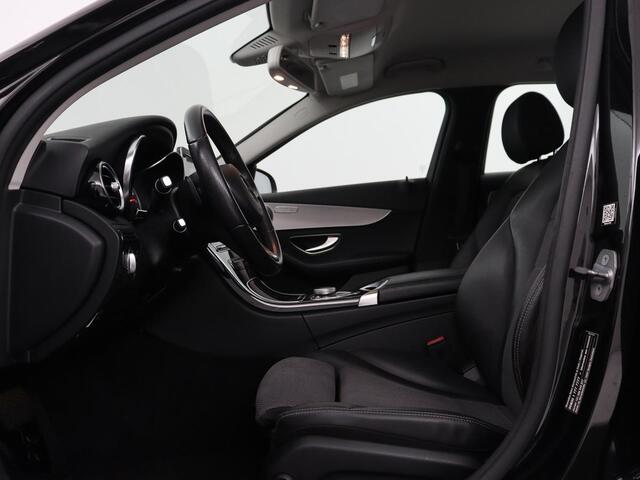 Mercedes-Benz C-KLASSE Estate 180 Business Solution | Half leder | Stoelverwarming | Navigatie | Bluetooth | Camera | Park assist | Cruise control | Climate control | Elektrische achterklep | Trekhaak