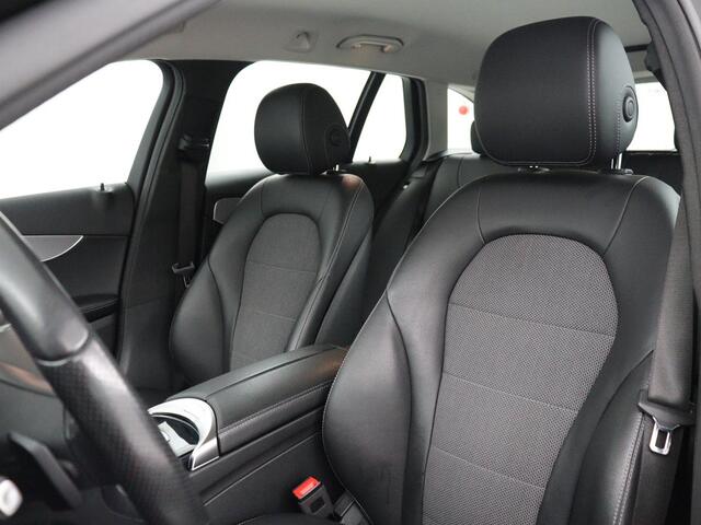 Mercedes-Benz C-KLASSE Estate 180 Business Solution | Half leder | Stoelverwarming | Navigatie | Bluetooth | Camera | Park assist | Cruise control | Climate control | Elektrische achterklep | Trekhaak