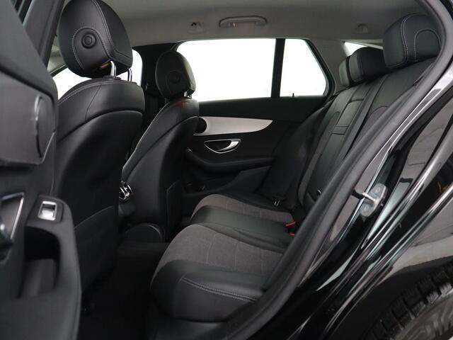 Mercedes-Benz C-KLASSE Estate 180 Business Solution | Half leder | Stoelverwarming | Navigatie | Bluetooth | Camera | Park assist | Cruise control | Climate control | Elektrische achterklep | Trekhaak