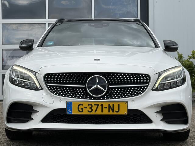 Mercedes-Benz C-KLASSE Estate 180 Business Solution AMG 156pk | Virtual Cockpit | Achteruitrijcamera | Bluetooth | Cruise control adaptief met stop&go en stuurhulp | DAB | Elektrisch glazen panorama-dak | Matrix led koplampen | Voorstoelen verwarmd | Zeer nette auto!