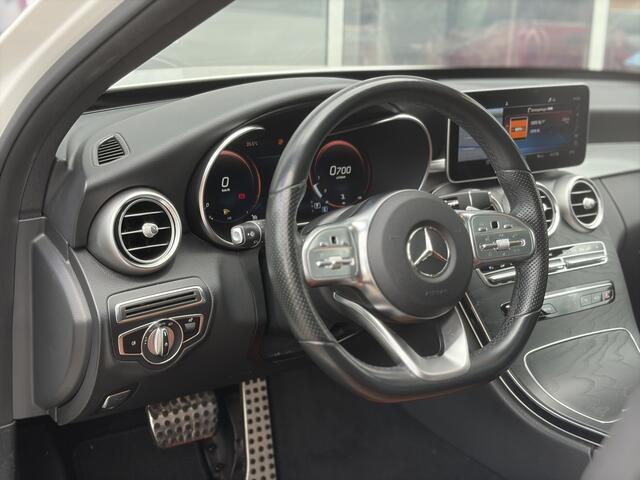 Mercedes-Benz C-KLASSE Estate 180 Business Solution AMG 156pk | Virtual Cockpit | Achteruitrijcamera | Bluetooth | Cruise control adaptief met stop&go en stuurhulp | DAB | Elektrisch glazen panorama-dak | Matrix led koplampen | Voorstoelen verwarmd | Zeer nette auto!