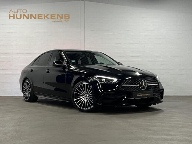 Mercedes-Benz C-KLASSE 180 AMG Line Ambiente verlichting | Cruise control | Stoelverwarming | Achteruitrij camera | AMG wielen | Carplay | Dodehoek | Navigatie