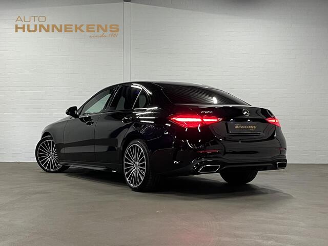 Mercedes-Benz C-KLASSE 180 AMG Line Ambiente verlichting | Cruise control | Stoelverwarming | Achteruitrij camera | AMG wielen | Carplay | Dodehoek | Navigatie