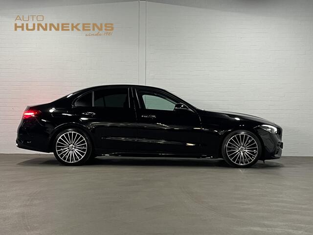 Mercedes-Benz C-KLASSE 180 AMG Line Ambiente verlichting | Cruise control | Stoelverwarming | Achteruitrij camera | AMG wielen | Carplay | Dodehoek | Navigatie