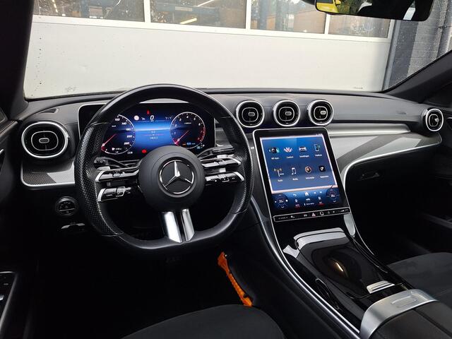 Mercedes-Benz C-KLASSE Estate 200 Launch Edition AMG Line | Trekhaak Wegklapbaar | Night Pakket | Achteruitrijcamera | Stoelverwarming | Sfeerverlichting | Dodehoekassistent | Elektrisch Bedienbare Achterklep