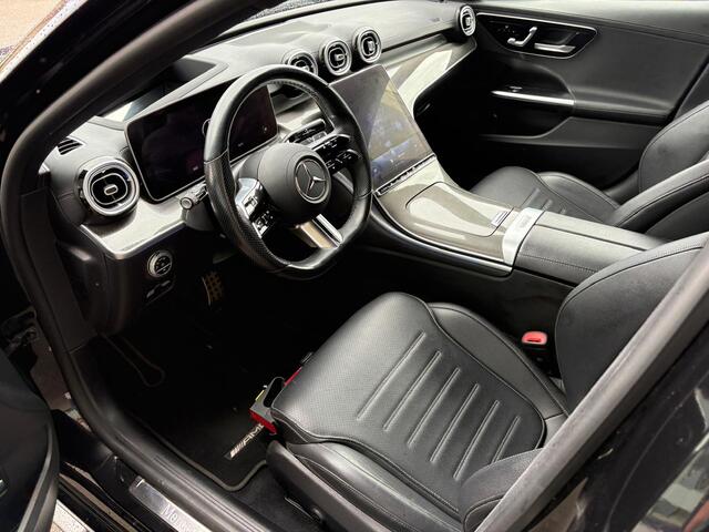 Mercedes-Benz C-KLASSE 300 e AMG Line | Panoramadak | Stoelverwarming | 360 Camera | Memory Seats | Dodehoekdetectie | Keyless | Ambiance Verlichting | Cruise Control | Navigatie | Leer
