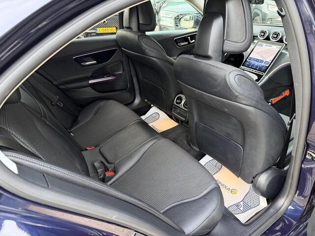 Mercedes-Benz C-KLASSE 300 e Luxury Line WEG KLAPBARE TREKHAAK | SFEER VERLICHTING | 360 GRADEN CAMERA | ELEKTRISCH VERSTELBARE STOELEN | STOELVERWARMING | STUURVERWARMING | STOELKOELING | PANORAMADAK | NAVIGATIE | LED | DODEHOEK DETECTIE | APPLE CARPLAY / ANDROID AUTO | ADAPTIEVE CRUISECONTROL |