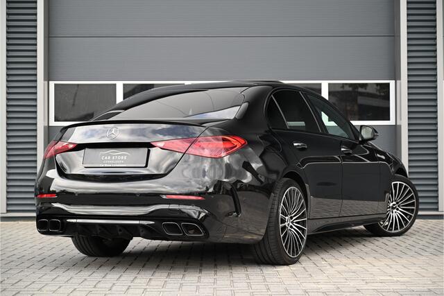 Mercedes-Benz C-KLASSE 300e AMG / SCHUIFDAK / C63 / LEDER / CAMERA / SFEERVERLICHTING / LED / 19"