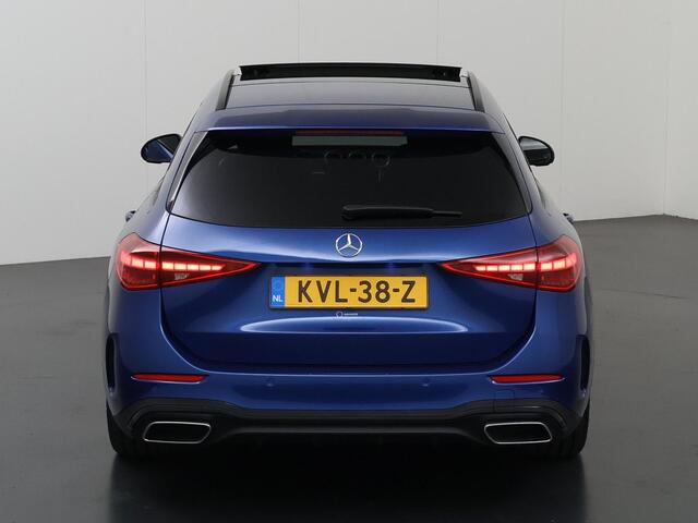 Mercedes-Benz C-KLASSE 300 e AMG Line | Trekhaak | 360 graden camera | Night | Panoramadak | Digital Light | Memory stoelen |