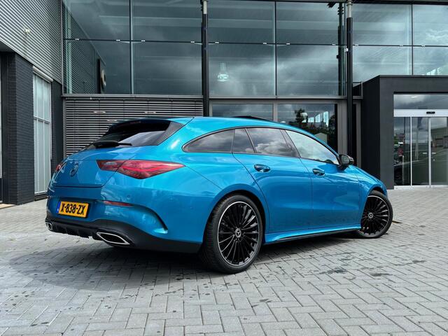 Mercedes-Benz CLA-KLASSE Shooting Brake 180 AMG Line | Panoramaschuifdak in glas | Sfeerverlichting | Achteruitrijcamera | (19 inch) multispaaks | Nightpakket |