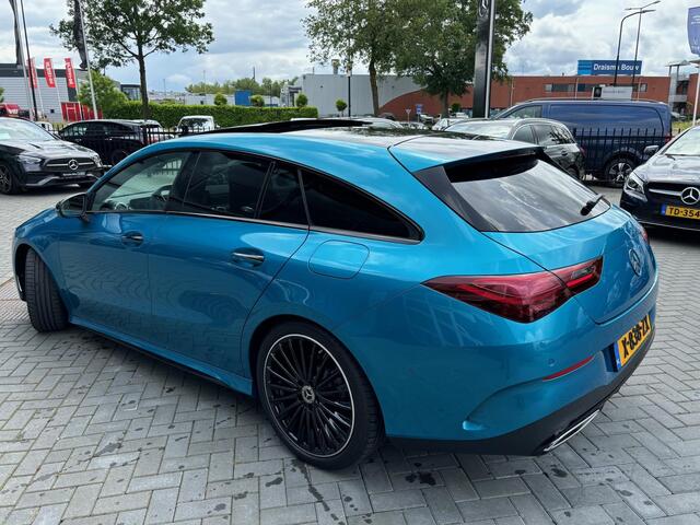 Mercedes-Benz CLA-KLASSE Shooting Brake 180 AMG Line | Panoramaschuifdak in glas | Sfeerverlichting | Achteruitrijcamera | (19 inch) multispaaks | Nightpakket |