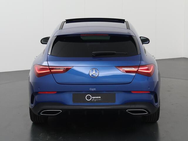 Mercedes-Benz CLA-KLASSE Shooting Brake 180 AMG Line | Night Pakket | Panoramadak | Sfeerverlichting | 19" multispaaks velgen | Trekhaak