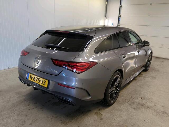 Mercedes-Benz CLA-KLASSE Shooting Brake 200 Aut. DCT AMG Line Night Pakket Plus Pakket Ambiente Verlichting Leder Alcantara Trekhaak Full LED Navigatie PDC VA + Camera