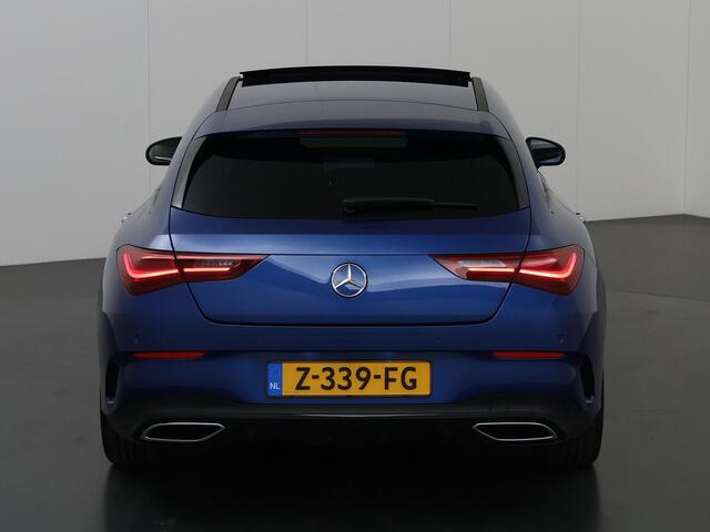 Mercedes-Benz CLA-KLASSE 180 Shooting Brake AMG Line | Panoramadak | Night Pakket | 19 inch | Sfeerverlichting | Spectraalblauw