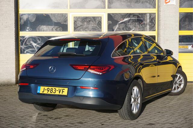 Mercedes-Benz CLA-KLASSE Shooting Brake 180 Automaat! Business Solution BJ2020 Lmv 16" | Led | Pdc | Navi | Elek. achterklep | Achteruitrijcamera | Virtual cockpit | Climate control | Cruise control | Verwarmde voorstoelen | Zwarte hemel | Getint glas