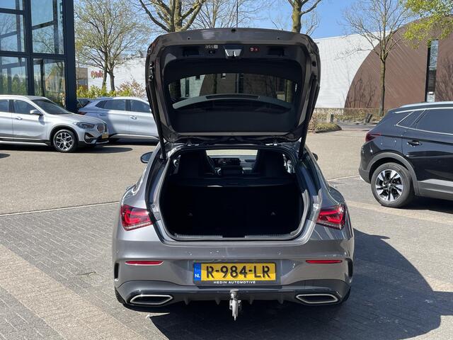 Mercedes-Benz CLA-KLASSE Shooting Brake 200 Business Solution AMG VAN: 36.900,- VOOR: 34.877,- UW LENTEVOORDEEL: 2.023,- AMBILIGHT | CAMERA | TREKHAAK | PANORAMADAK | ELECTR A.KLEP.