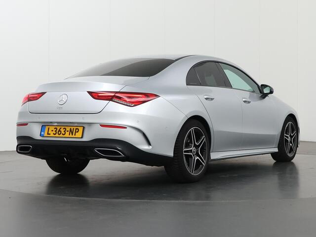 Mercedes-Benz CLA-KLASSE 180 Business Solution AMG | Trekhaak | Achteruitrijcamera | Sfeerverlichting | Widescreen | Stoelverwarming |