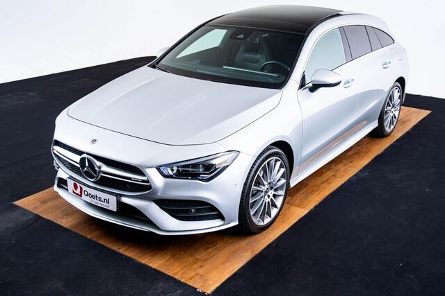 Mercedes-Benz Cla Shooting Brake 250 e AMG Line Panoramadak - Trekhaak - Sfeerverlichting - Memorystoelen - Stoelverwarming - Dodehoekassistent - Camera - 19 inch - Lederpakket