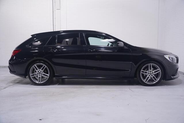 Mercedes-Benz Cla Shooting Brake 180 Business Solution AMG NL-auto NAP navigatie half lederen sportstoelen 18"-lmv apple-carplay led-verlichting PDC v+a schakelflippers aan het stuur cruise-controle private-glas Climatic bleutooth stoel-verwarming