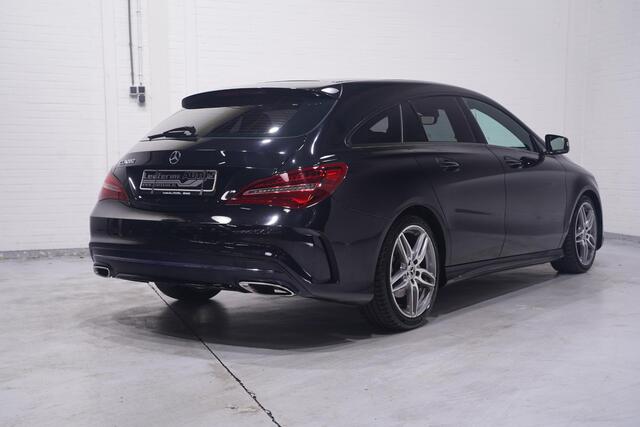 Mercedes-Benz Cla Shooting Brake 180 Business Solution AMG NL-auto NAP navigatie half lederen sportstoelen 18"-lmv apple-carplay led-verlichting PDC v+a schakelflippers aan het stuur cruise-controle private-glas Climatic bleutooth stoel-verwarming