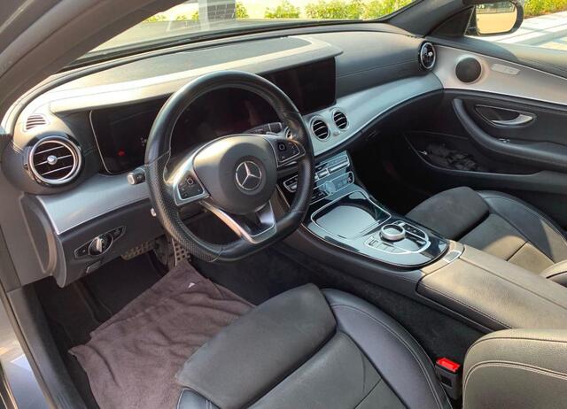 Mercedes-Benz E-KLASSE 200 AMG Pano | Widescreen | Camera | Nightpakket | Stoelverwarming | LED | Sfeerverlichting | Dealer Onderhouden