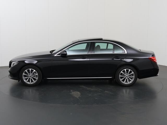 Mercedes-Benz E-KLASSE 200 Business Solution | Panoramadak | Sfeerverlichting | Widescreen | Agility Control | Rijassistentiepakket | Distronic | Stoelverwarming |