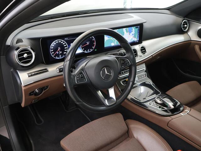 Mercedes-Benz E-KLASSE 200 Business Solution | Panoramadak | Sfeerverlichting | Widescreen | Agility Control | Rijassistentiepakket | Distronic | Stoelverwarming |