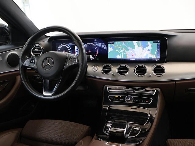 Mercedes-Benz E-KLASSE 200 Business Solution | Panoramadak | Sfeerverlichting | Widescreen | Agility Control | Rijassistentiepakket | Distronic | Stoelverwarming |