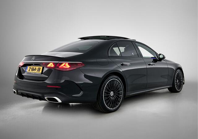 Mercedes-Benz E-KLASSE 400 e 4MATIC AMG Line Panoramadak, hyperscreen, head up display, multispaaks Inclusief 24 maanden MB Certified garantie voor Europa.