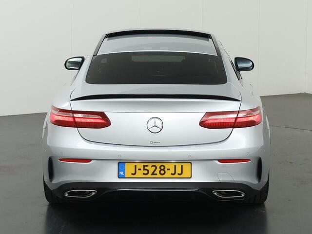 Mercedes-Benz E-KLASSE Coupé 200 Premium Plus | AMG | Night | Panoramadak | Memory | Burmester | Rijassistentiepakket | Lederen bekleding | 20" lichtmetalen velgen |